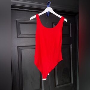 Red body suit! Unsure of brand.